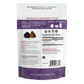 A Real Mushrooms pouch with a purple Organic Chaga Extract Powder for Pets label on it.