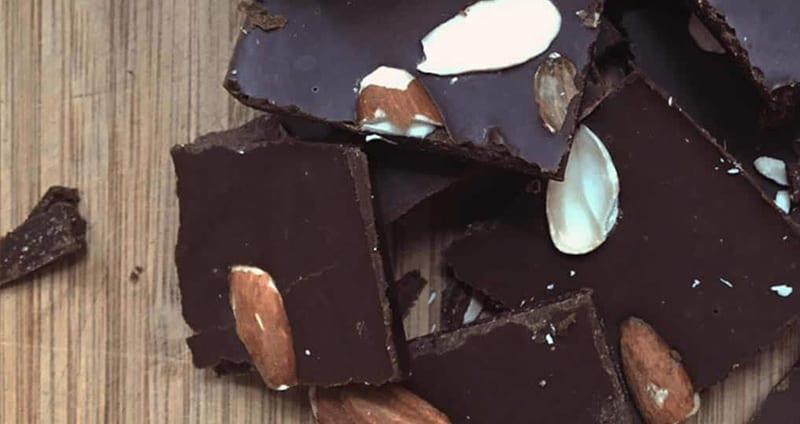 broken chocolate bars with almonds