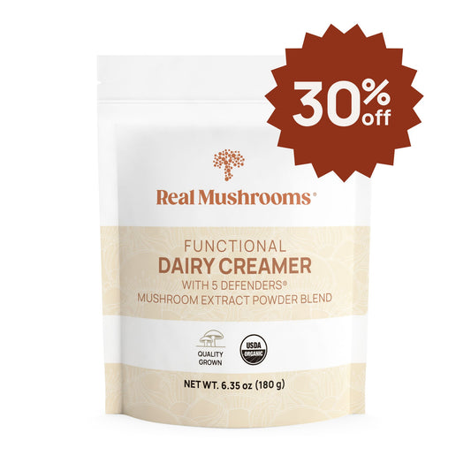 A white pouch of Real Mushrooms Functional Dairy Creamer Powder with a USDA Organic label and organic mushroom extract, displaying a "30% off" badge in the top right corner.