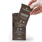 A hand holds a chocolate bar labeled "Real Mushrooms - Dark Chocolate" infused with organic mushroom extracts. Each vegan-friendly bar is packaged in a brown box, proudly highlighting its commitment to sustainable ingredients, coming as part of the Mushroom Chocolate Bar - 5 Pack.