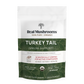 Front of Real Mushrooms Turkey Tail Extract - Bulk Powder pouch, showcasing immune health support, organic mushroom supplement benefits, vegan and gluten-free formula, 100 servings per pack, and science-verified active compounds.