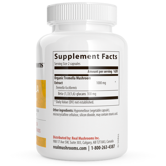 A white bottle of Real Mushrooms Organic Tremella Extract Capsules displays “Supplement Facts,” listing Organic Tremella fuciformis mushrooms and Beta-glucans among its ingredients, with distributor details at the bottom.