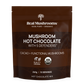 A brown pouch labeled "Real Mushrooms Mushroom Hot Chocolate Mix," features USDA Organic details, organic cacao powder, an organic mushroom extract blend, and info on cacao, functional mushrooms, and serving size.