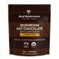 A brown, resealable bag of Real Mushrooms Mushroom Hot Chocolate Mix displays heirloom cacao, organic mushroom extract, mushrooms, and a USDA Certified Organic seal on its label.