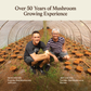 Inside a greenhouse of mushrooms, two experts—labeled with names and roles—kneel. Text above: "Over 50 Years of Mushroom Growing Experience." They're the team behind Real Mushrooms' Daily Dawg Powder for Pets, supporting whole-body dog wellness.