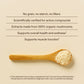 A wooden spoon with mushroom powder rests on a beige surface; above it are product claims for Real Mushrooms’ Vitamin D from Organic Mushrooms, highlighting its plant-based vitamin D and health benefits.