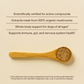 A wooden spoon with Real Mushrooms’ Daily Dawg Powder for Pets on a beige background, featuring text about health benefits and an FDA disclaimer.