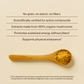 A wooden spoon filled with yellow RealBoost - Cordyceps, Guayusa and Ginseng powder by Real Mushrooms rests on a beige background beside text listing product benefits and an FDA disclaimer.