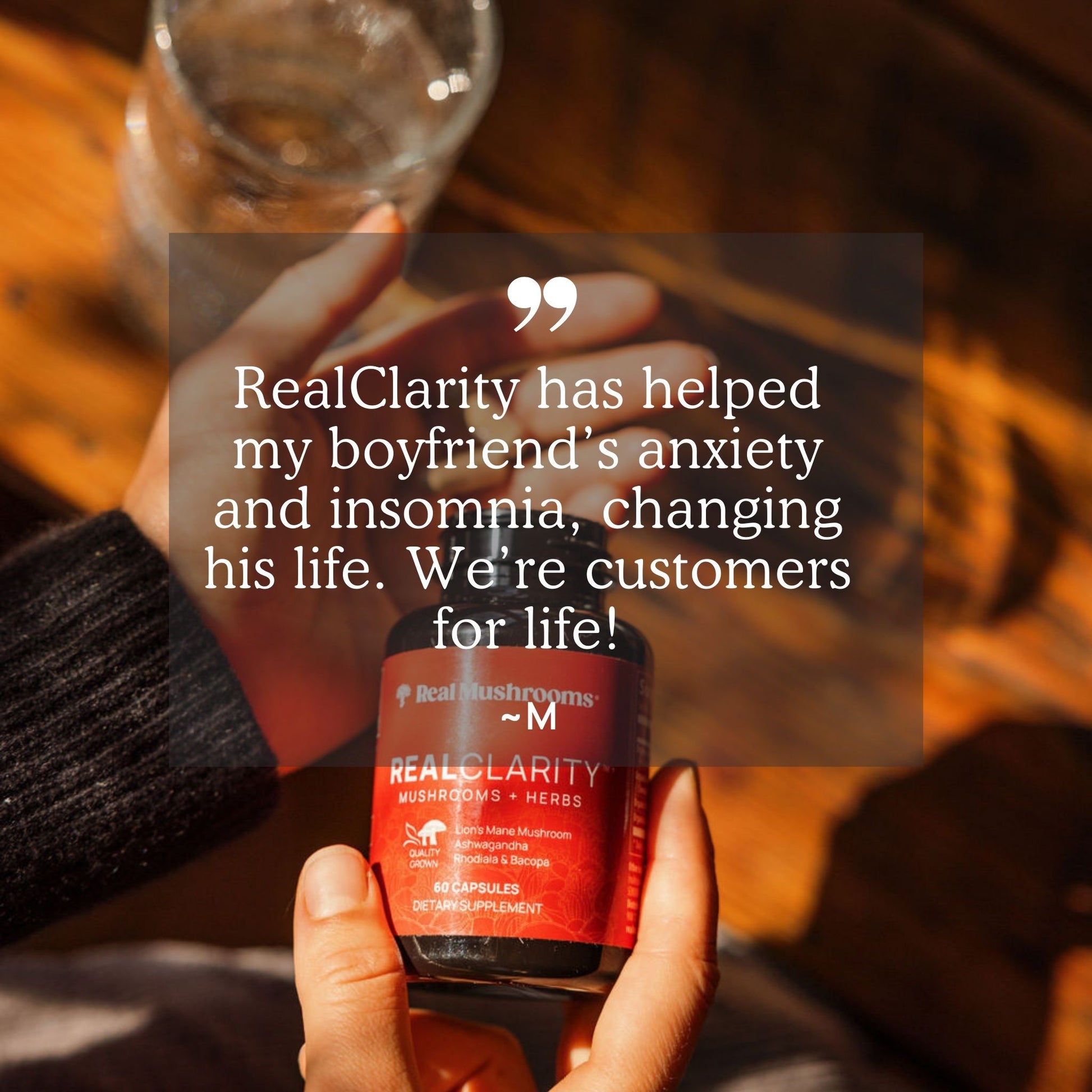 A person holds a bottle of Real Mushrooms' RealClarity - Lion's Mane, Ashwagandha, Rhodiola, and Bacopa supplement, which boasts certified organic ingredients, next to a testimonial about its benefits for anxiety and insomnia.