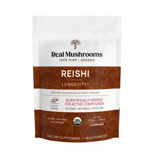 A white and brown pouch labeled "Real Mushrooms Organic Reishi Mushroom Powder – Bulk Extract," an organic supplement rich in beta-glucans, with quality and dietary certifications displayed on the front.