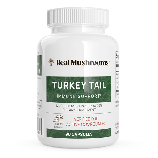 A white bottle labeled “Real Mushrooms Turkey Tail Mushroom Capsules,” containing 90 capsules made with mushroom extract powder rich in beta-glucans, designed to help support a healthy immune system.