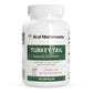 A white bottle labeled "Real Mushrooms Turkey Tail Mushroom Capsules," contains 90 capsules of turkey tail mushroom extract with beta-glucans for daily immune support.