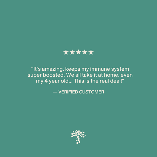 A five-star review praises Real Mushrooms 5 Defenders® Organic Mushroom Blend Capsules for boosting immune support for the whole family, including a 4-year-old, with verified customer attribution and tree logo shown.