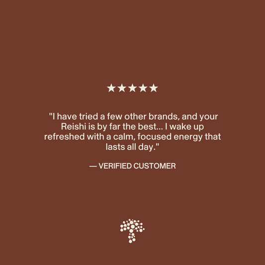 A five-star review praises Real Mushrooms Organic Reishi Mushroom Capsules for providing calm, focused energy that lasts all day. White text appears on a brown background with a small tree logo at the bottom.
