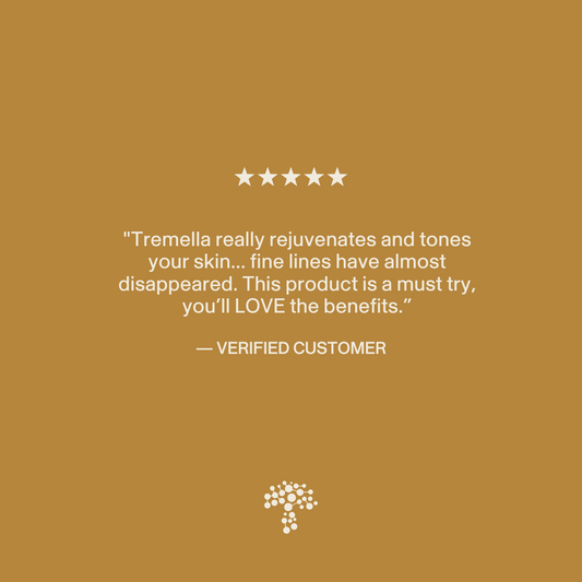 Five-star customer review on a brown background praising Real Mushrooms Organic Tremella Extract Capsules for rejuvenating skin and reducing fine lines, attributed to a verified customer. Brand logo featured at the bottom.