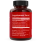 A bottle of RealClarity by Real Mushrooms, featuring a red design and a white label displaying the supplement facts, contains extracts of Lion's Mane mushroom, Ashwagandha Root, Rhodiola Root, and Bacopa Leaf. The serving size is 2 capsules.