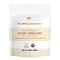 A package of Real Mushrooms Functional Dairy Creamer Powder with organic mushroom extract, labeled as USDA Certified Organic, net weight 6.35 oz (180g).