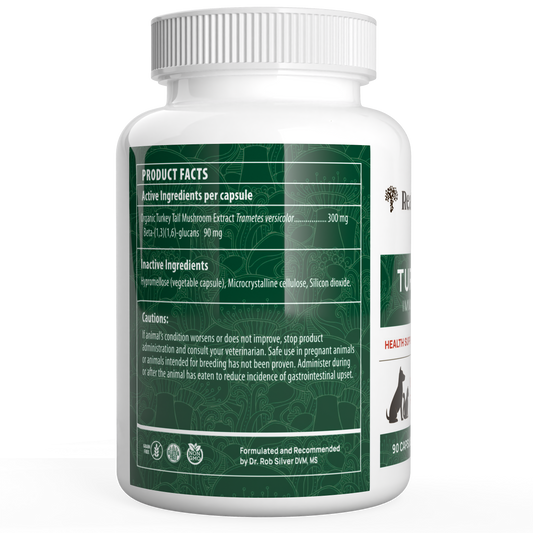 White bottle labeled with product facts, listing active and inactive ingredients, cautions, and dosage info for Turkey Tail Extract Capsules for Pets by Real Mushrooms—an organic beta-glucans mushroom supplement for pets.