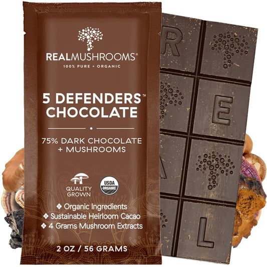 A package of Real Mushrooms 5 Defenders Organic Cacao Mushroom Chocolate, 75% dark chocolate with mushroom extracts, partially unwrapped to show a segmented chocolate bar.